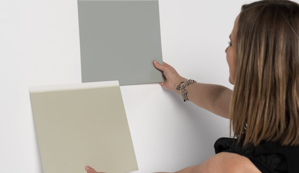 Jaclyn Rogers shows paint samples
