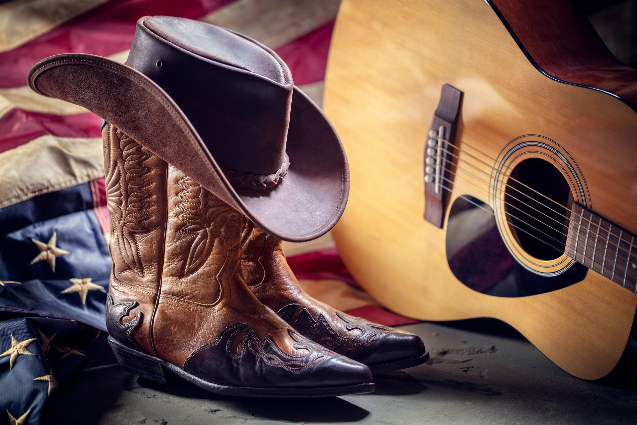 country western hat, boots, guitar